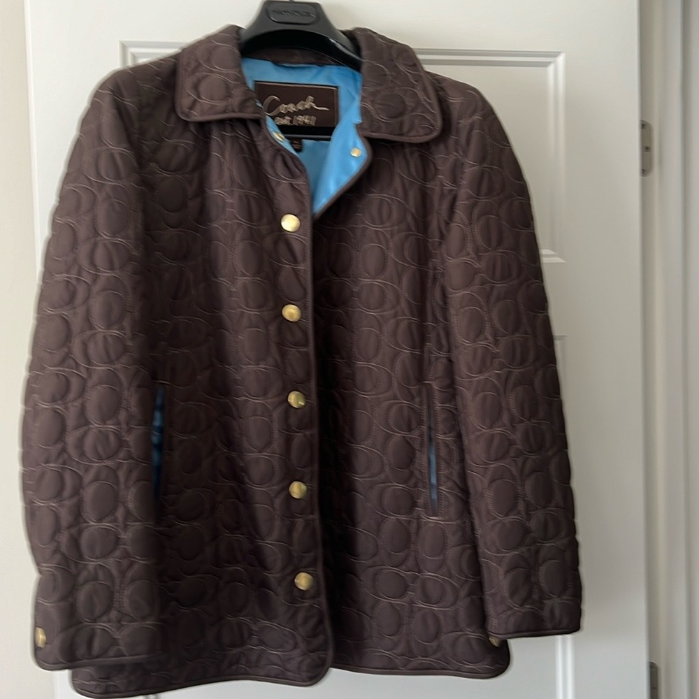 Original Coach monogrammed quilted jacket, brown with snap button closure.size M